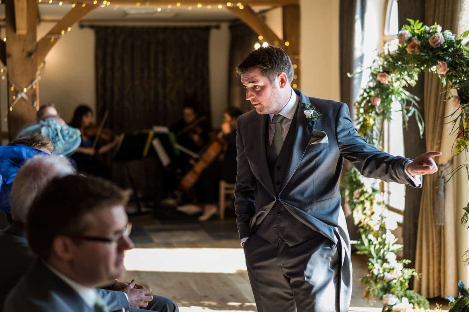 Groom waiting for bride at King Arthur Hotel in Gower, South Wales
