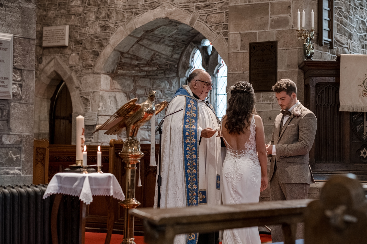 Marriage ceremony at Church of St Cadoc, Raglan, Monmouthshire, South Wales