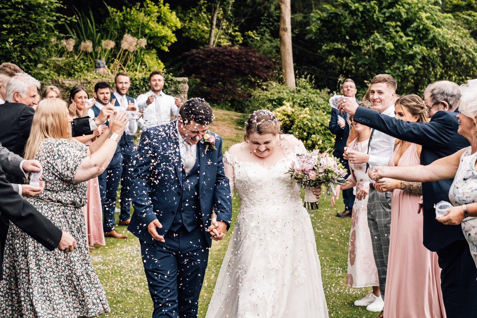 Confetti thrown at bride and groom