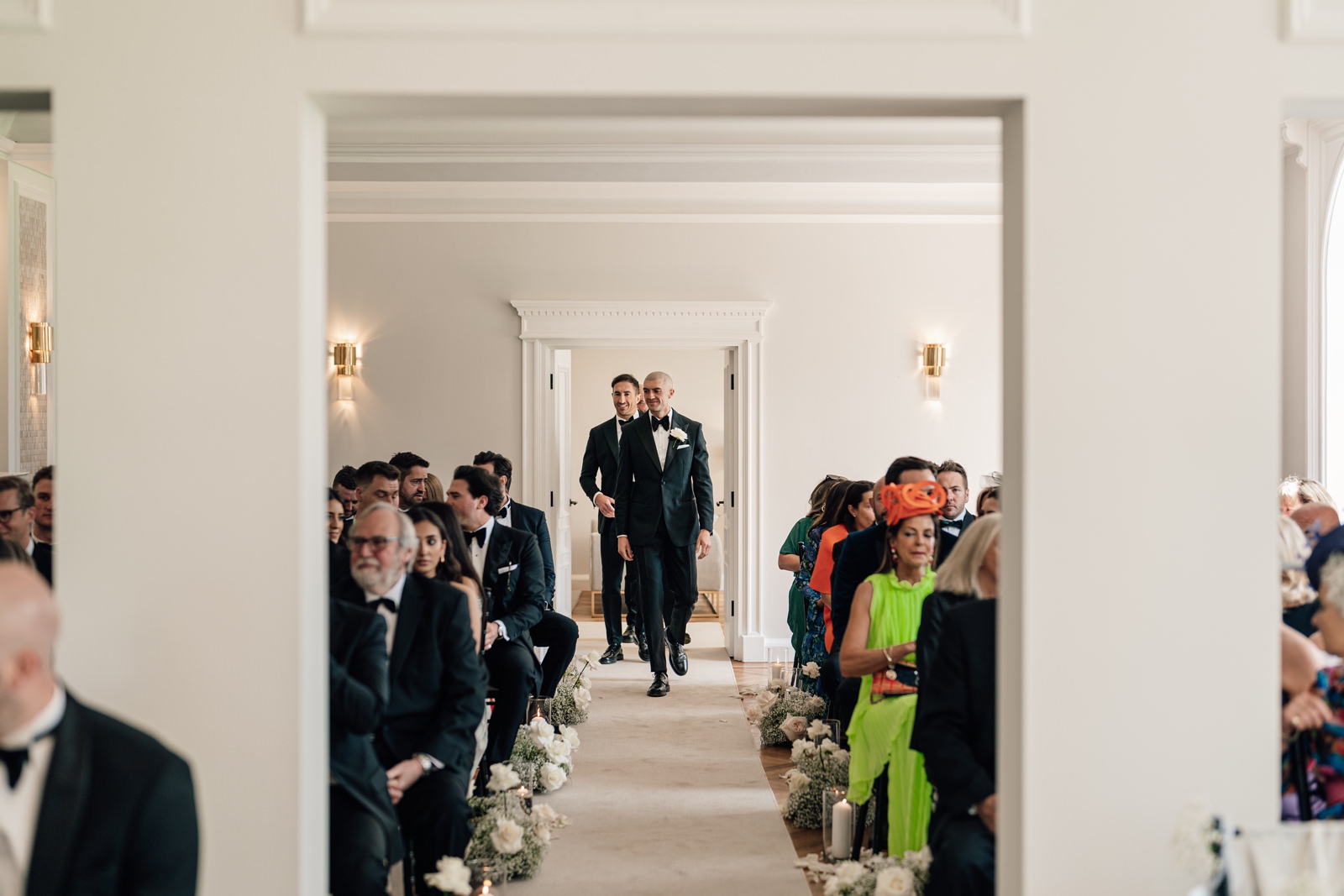 groom walks up aisle at Sant Ffraed House