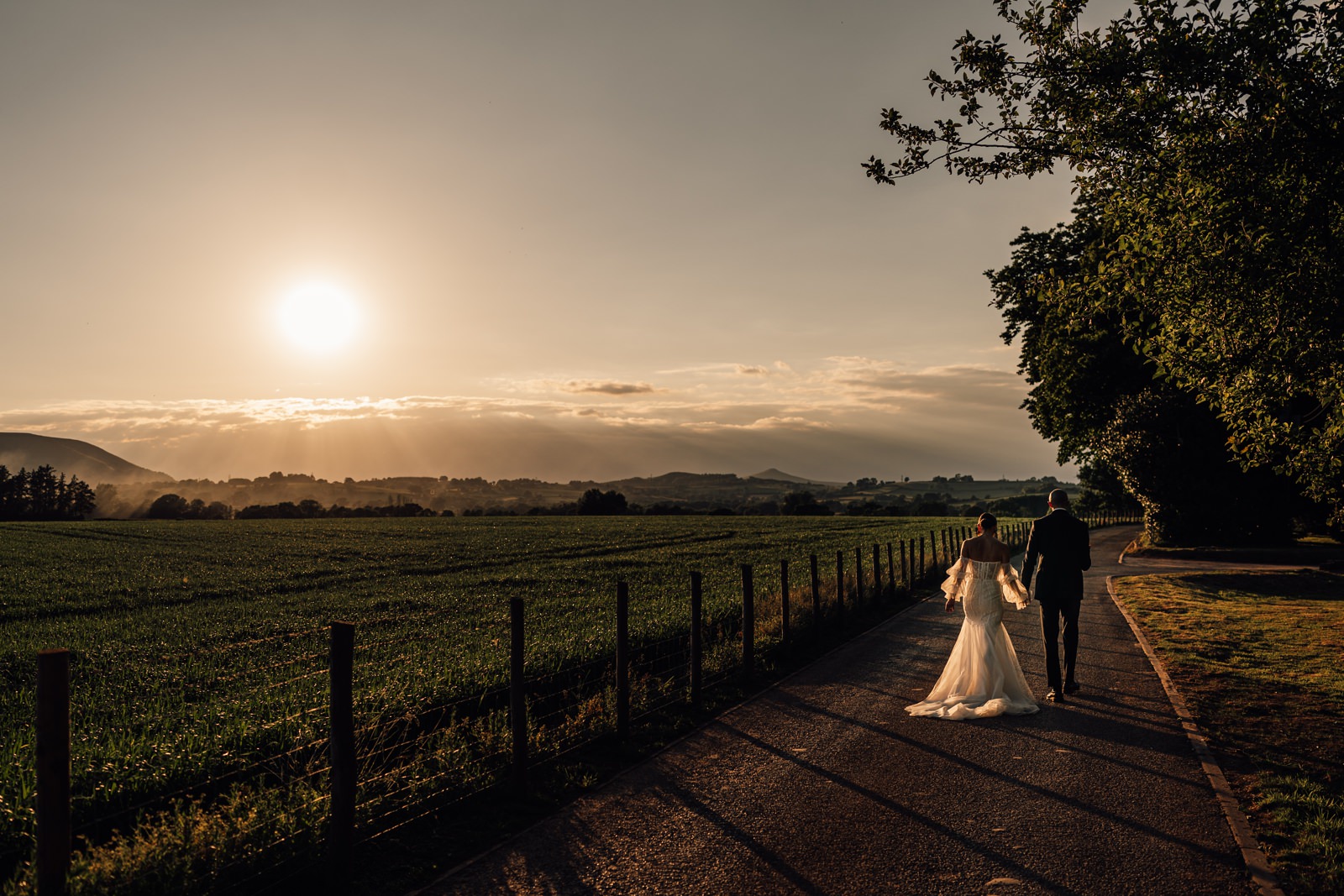 Wedding portraits in evening sun at Sant Ffraed House