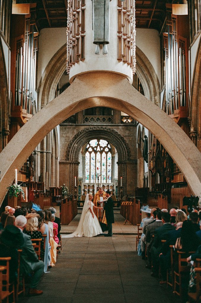 35mm analogue film photograph of marriage ceremony at Llandaff Cathedral in Cardiff, South Wales.